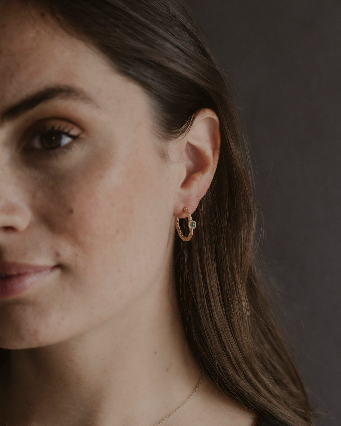 model wears Chalcedony Lichen Branch Gold Medium Hoops