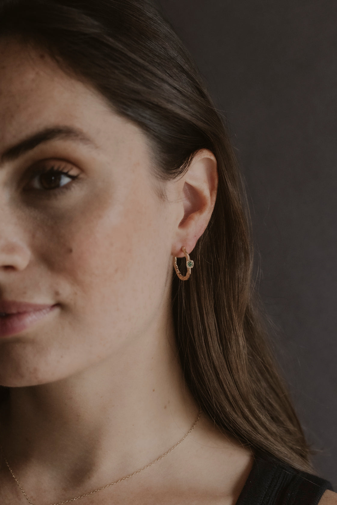 model wears Chalcedony Lichen Branch Gold Medium Hoops