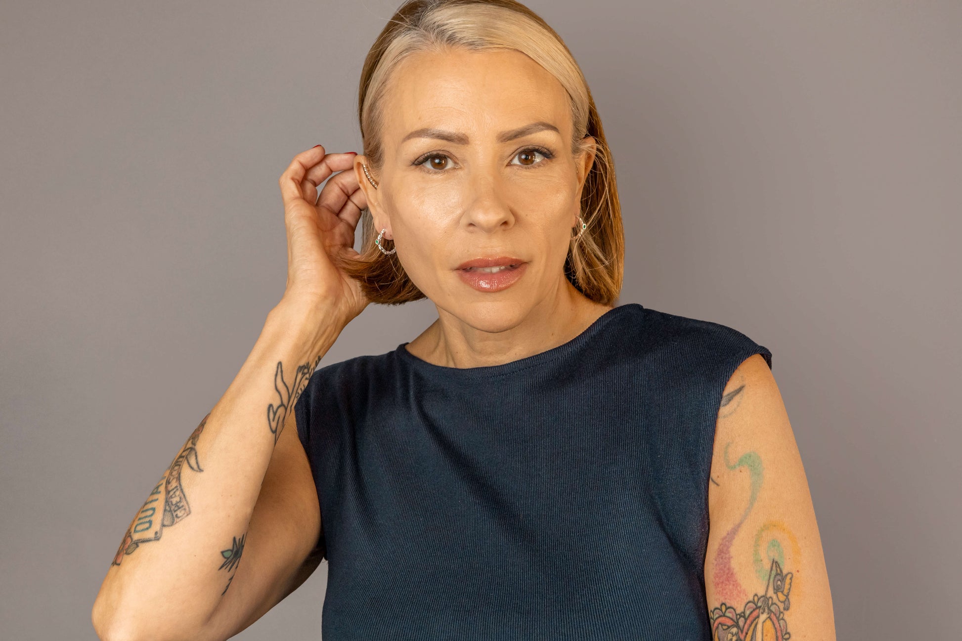 model wears Chalcedony Lichen Branch Silver Medium Hoops