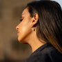 model wears Moonstone and Gold Lichen Hoop Earrings