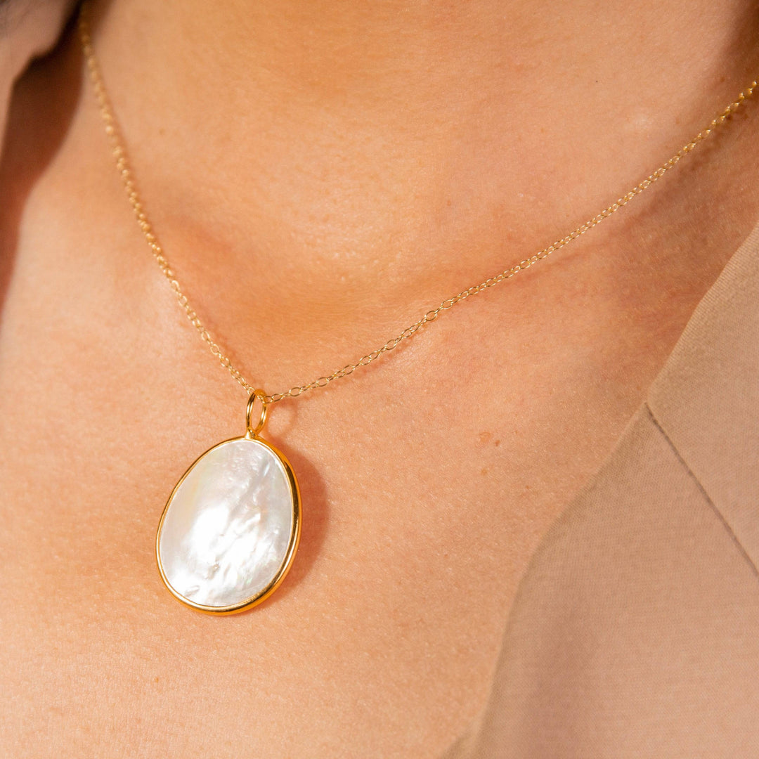 model wears Mother of Pearl Large Gold Pendant Necklace