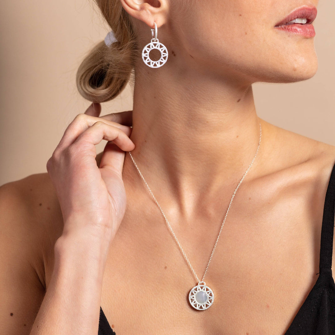 model wears Mother of Pearl and Silver Geometric Disc Necklace