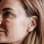 model wears Opal Silver Star Mini Stud Earrings