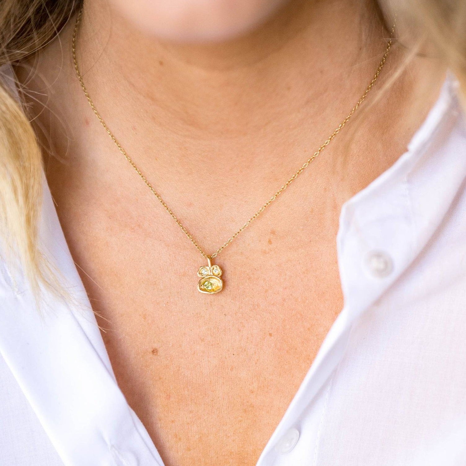 model wears Peridot and Gold Lichen Pendant Birthstone Necklace