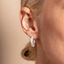 model wears Geometric Silver Hoop Earrings