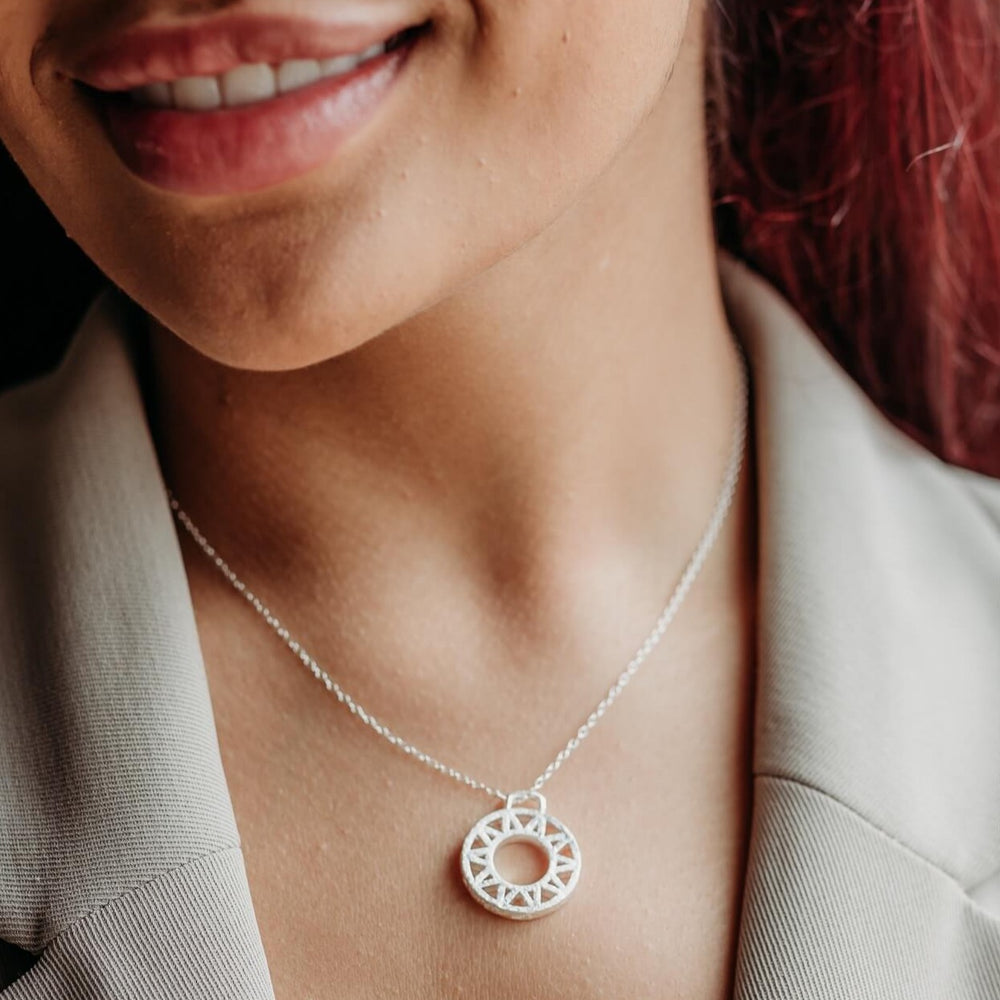 model wears Geometric Silver Disc Pendant Necklace