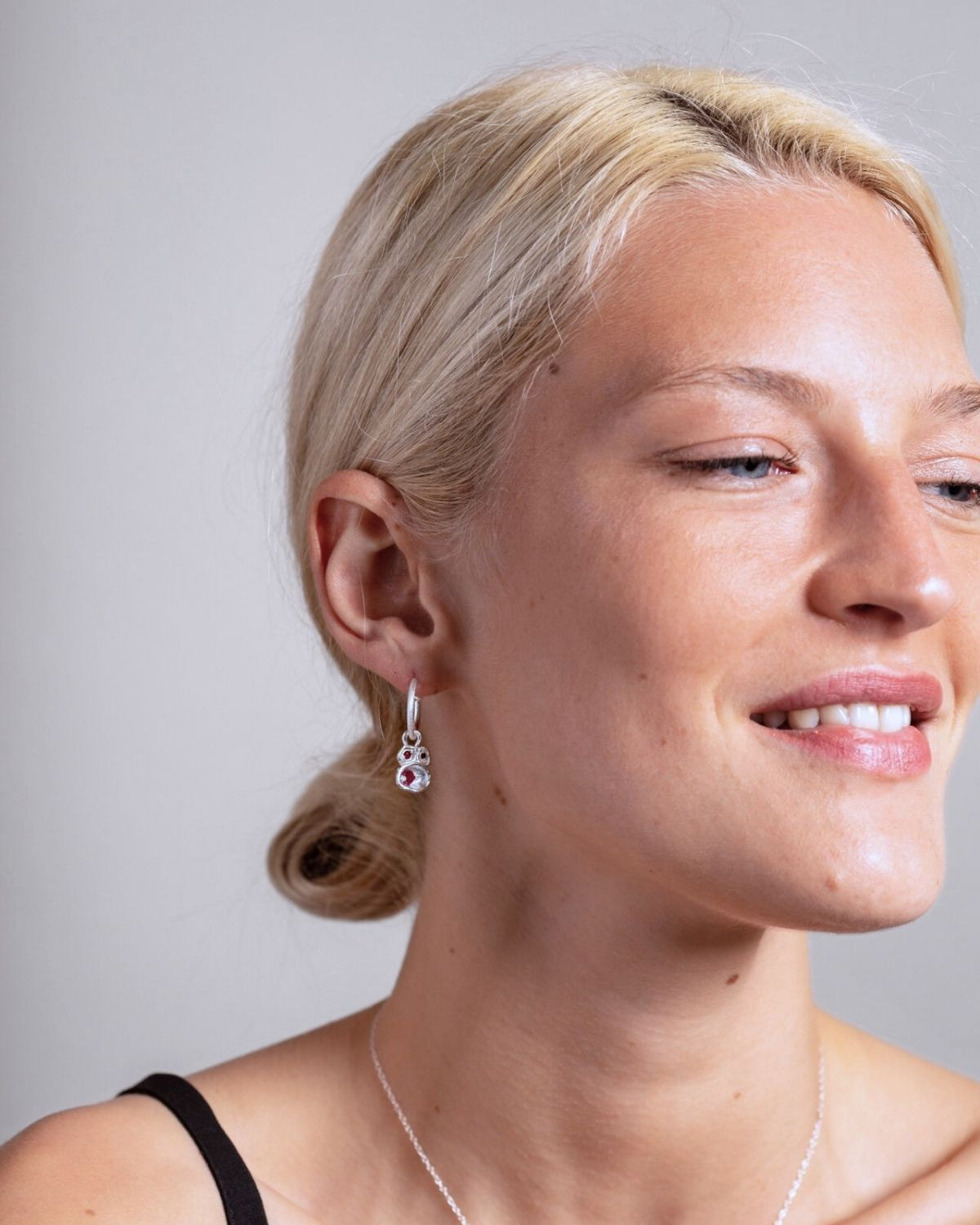 model wears Ruby Silver Lichen Hoop Earrings