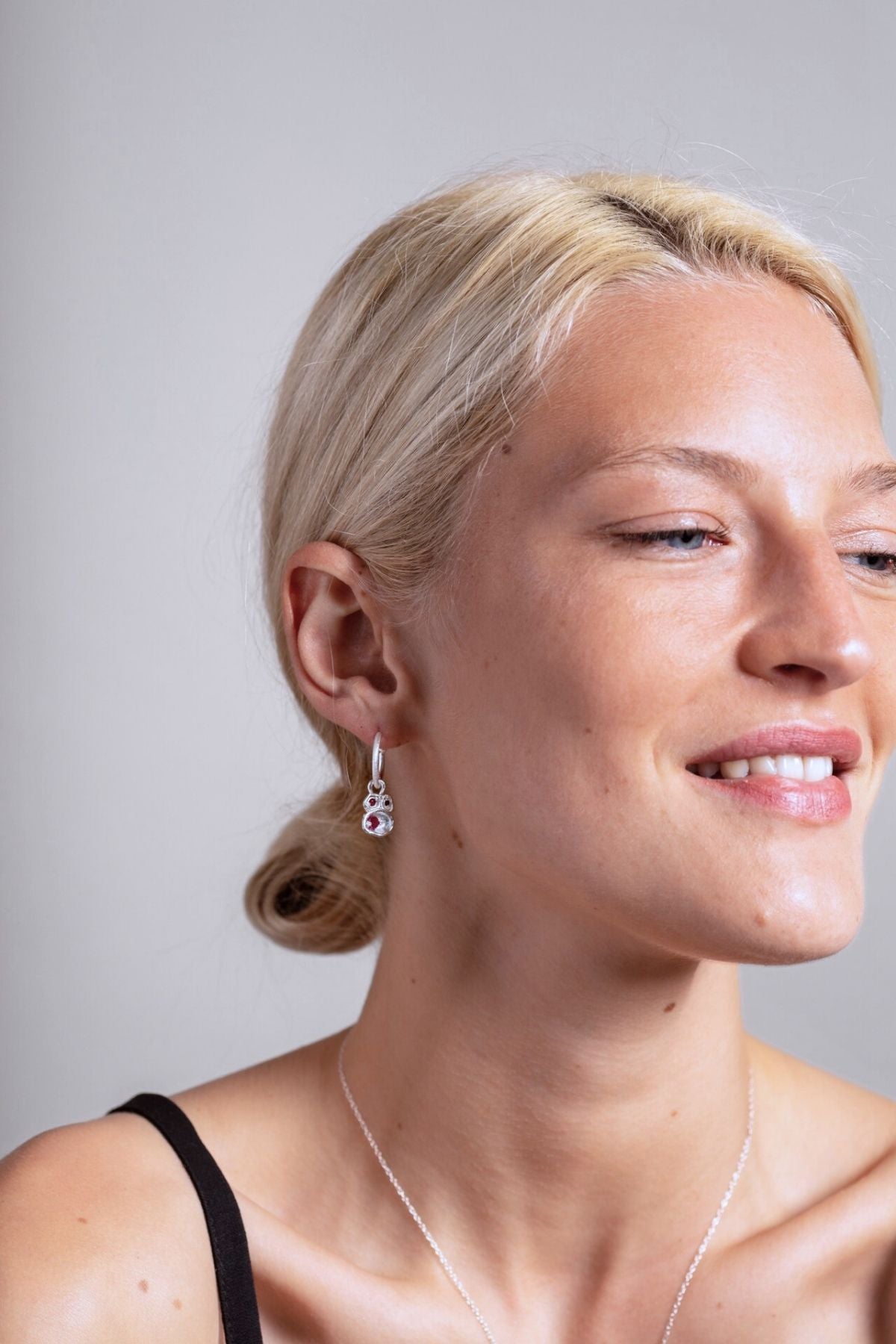 model wears Ruby Silver Lichen Hoop Earrings
