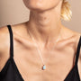 model wears Blue Sapphire and Silver Lichen Birthstone Pendant Necklace