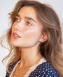 model wears Fan Cubic Zirconia Gold Labret Stud Earring
