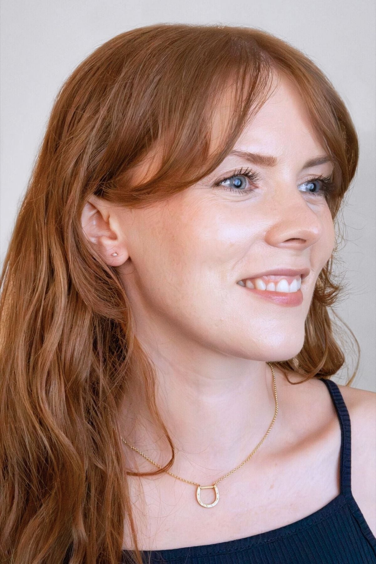 model wears Clear Cubic Zirconia Gold Labret Earring