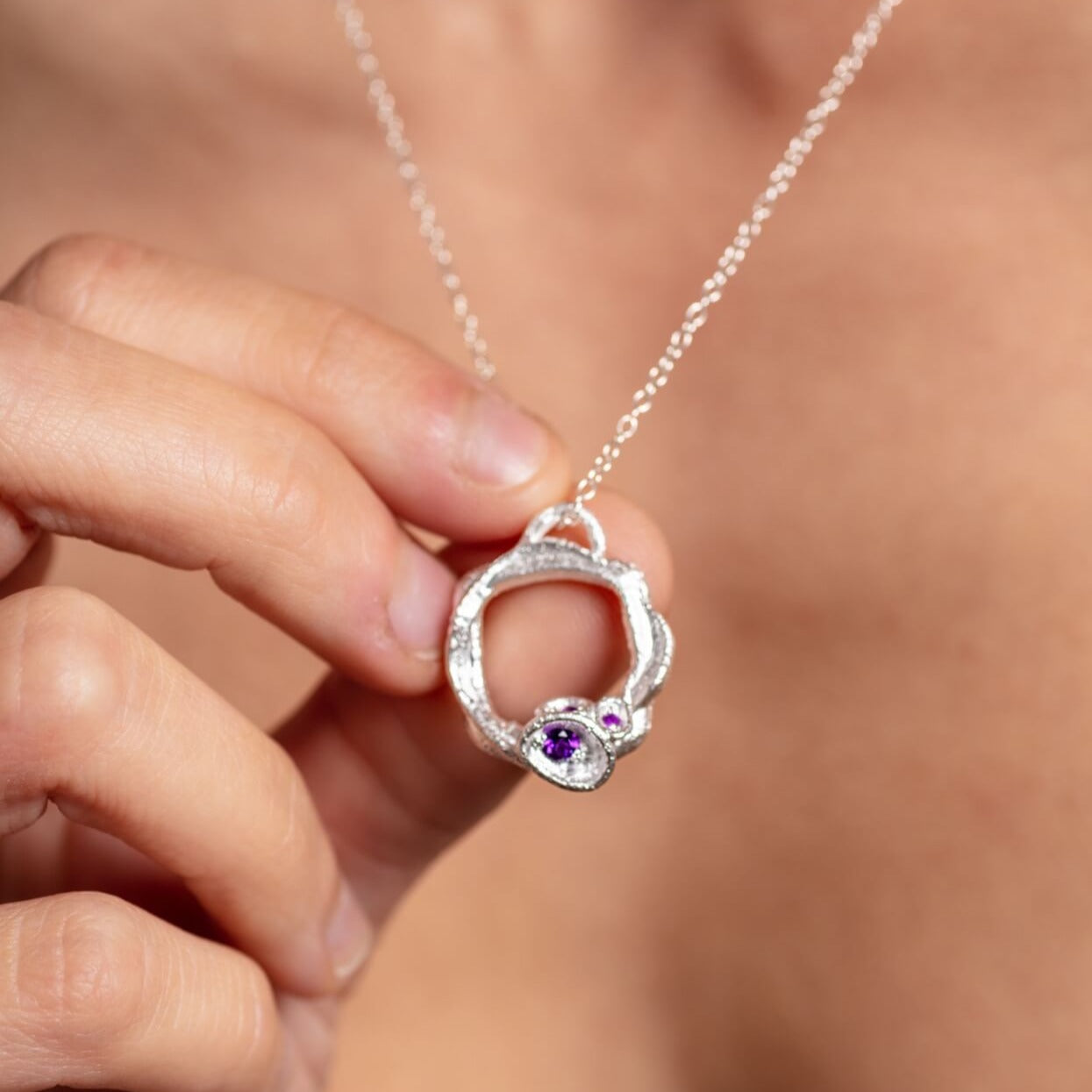 all-groups model-wears-silver-amethyst-gemstone-birthstone-large-branch-eternity-necklace-claire-hill-designs-close-up