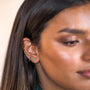model wears silver and lab-grown blue opal stud earrings