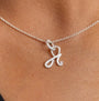 model wears Silver Shorthand Charm Pendant meaning Fearless - Claire Hill Designs