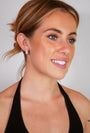 model wears silver emerald branch hoop earrings 