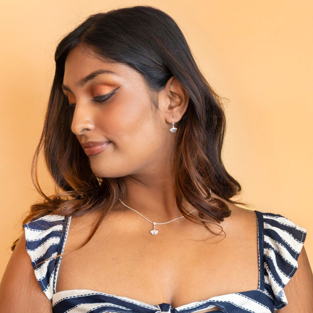 model wears Ginkgo Leaf Silver Earrings