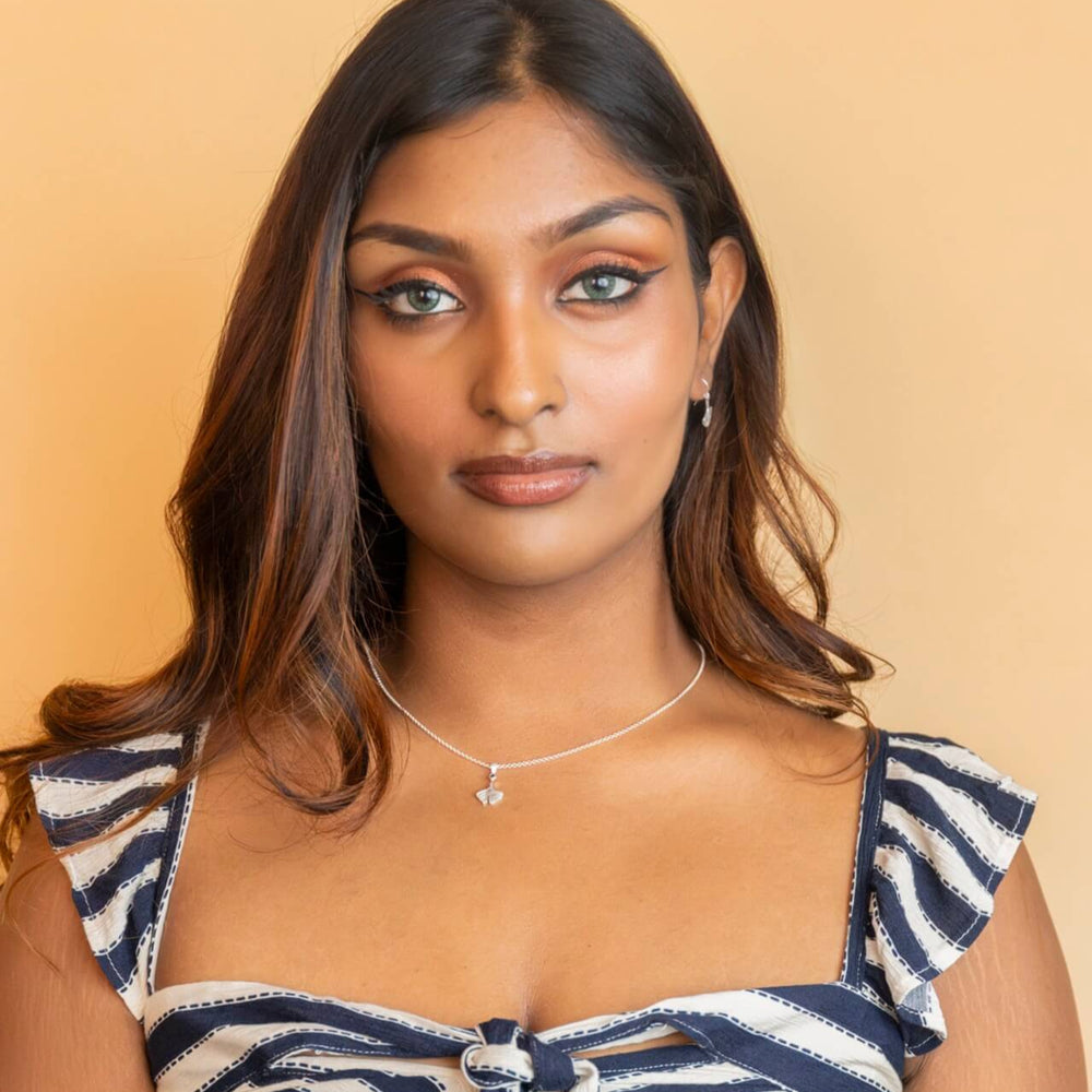 model wears Ginkgo Leaf Silver Charm Necklace