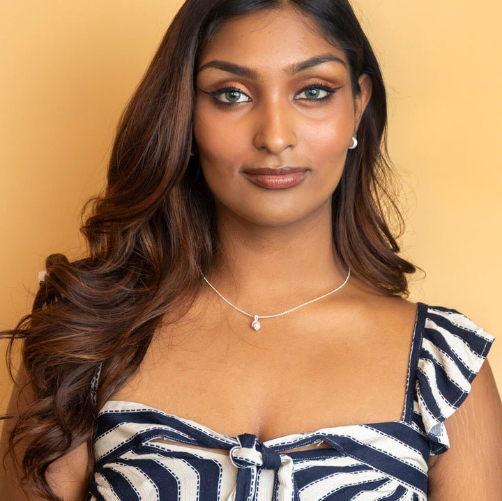 model wears silver Lemon Charm Necklace - Claire Hill Designs