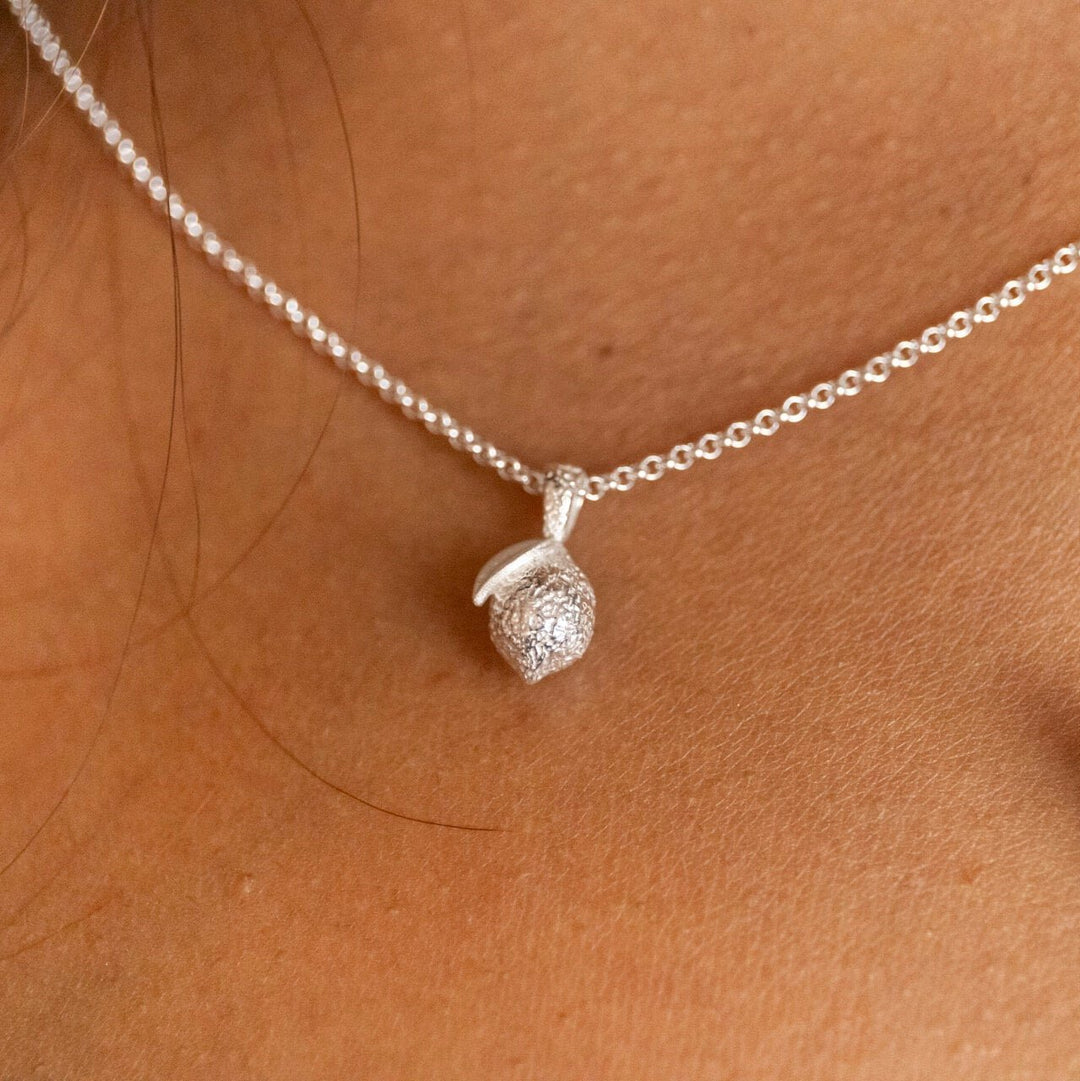 model wears silverLemon Charm Necklace - Claire Hill Designs
