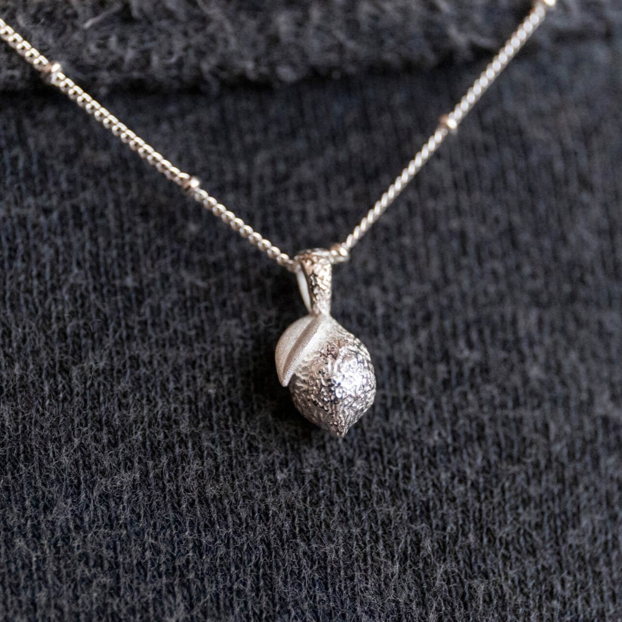 model wears Silver Lemon Charm Necklace - Claire Hill Designs