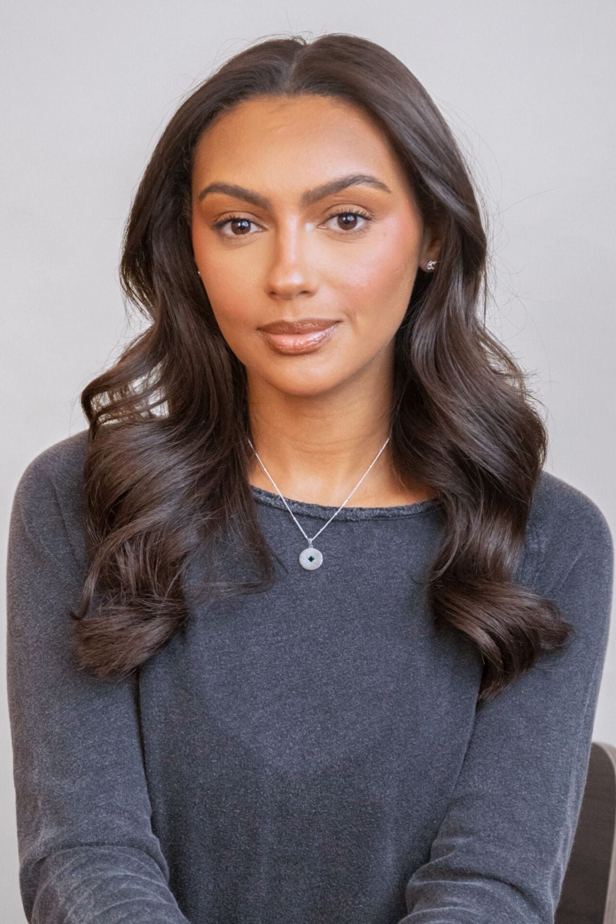 model wears Lovespoon Silver Charm Pendant necklace 