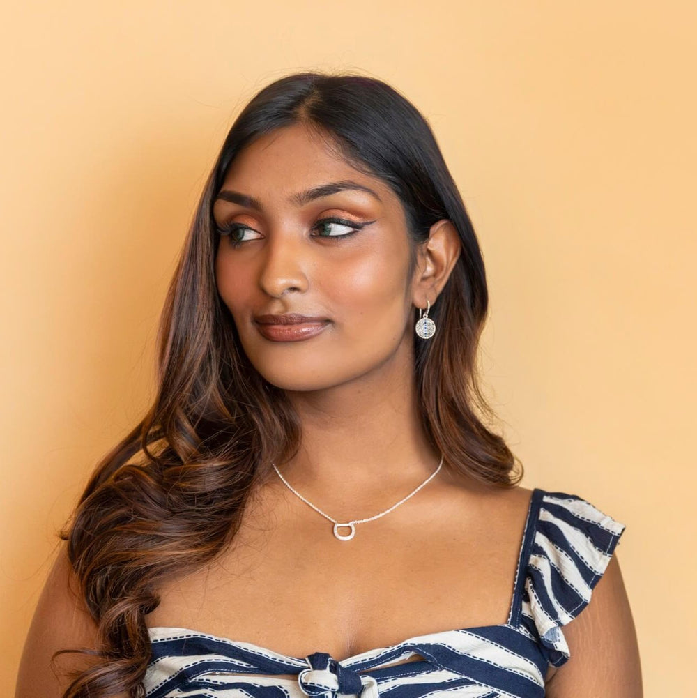 model wears Silver and Cubic Zirconia Horseshoe Charm Pendant Necklace - Claire Hill Designs