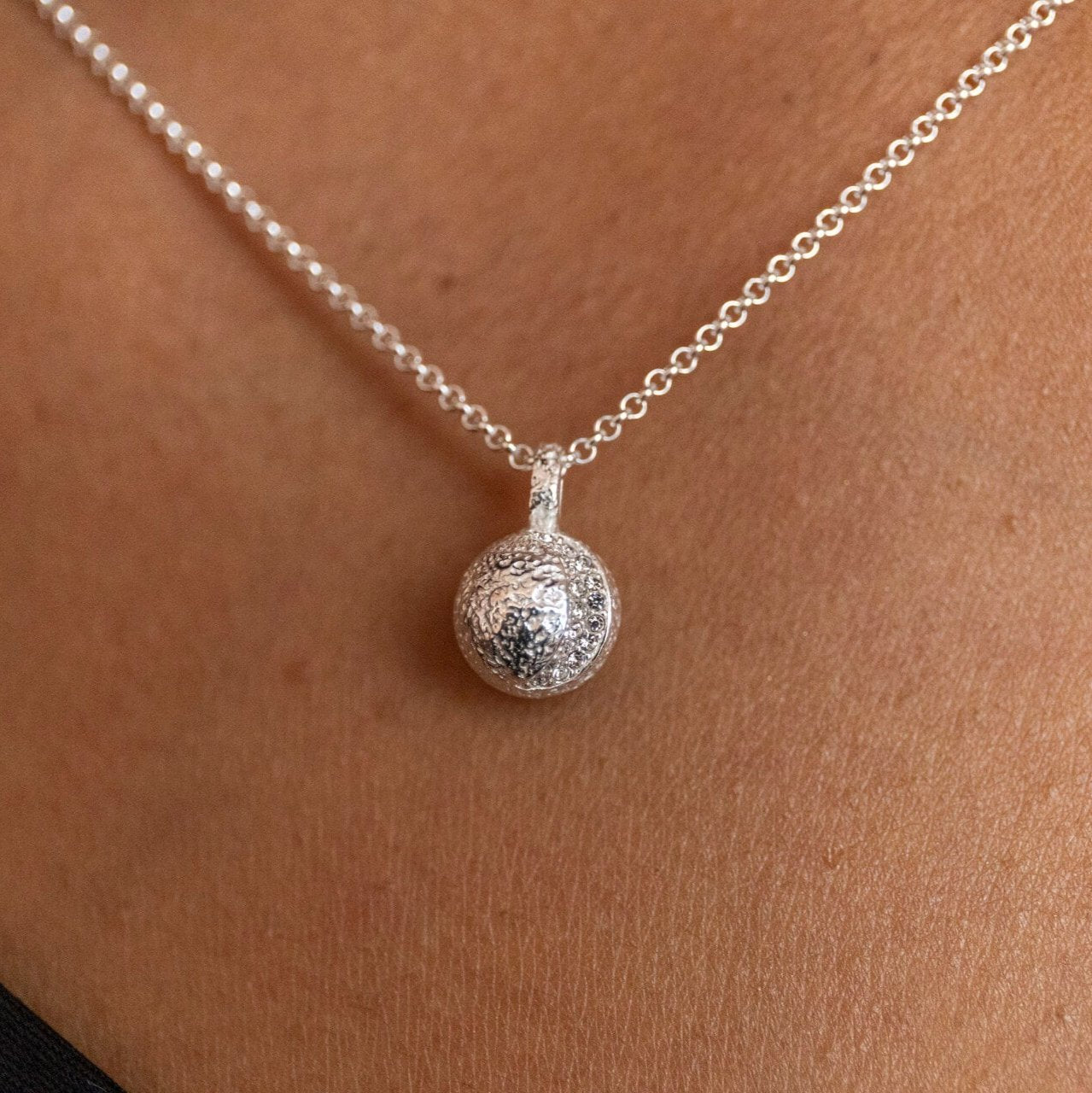 Model wears sparkly crescent silver moon Charm Necklace - Claire Hill Designs 