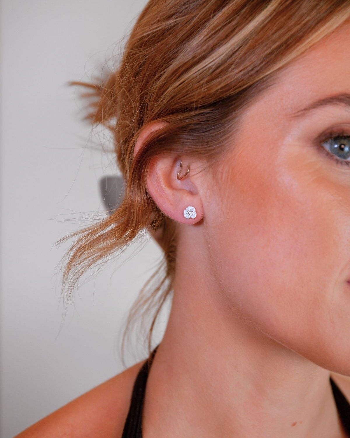 model wears White Topaz Silver Lichen Stud Earrings