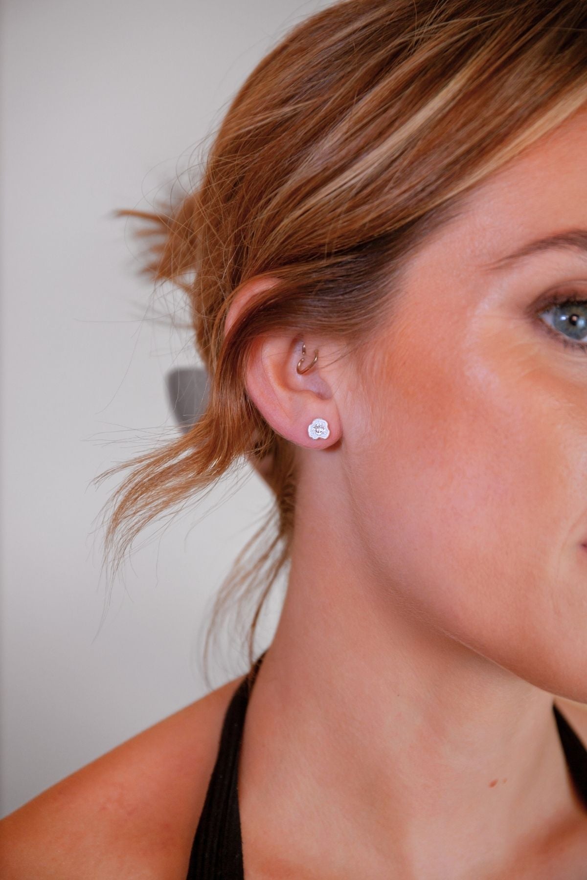 model wears White Topaz Silver Lichen Stud Earrings