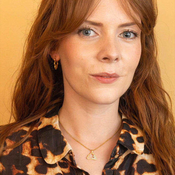model wears Sparkly Gold Cloud Hoop Earrings and Sparkly Gold Cloud Charm Pendant Necklace - Claire Hill Designs 