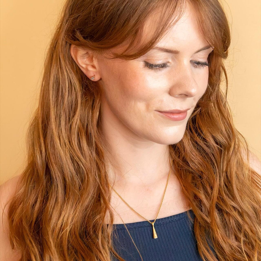model wears 18k Gold Vermeil Comet Charm Pendant on rolo gold vermeil chain  - Claire Hill Designs