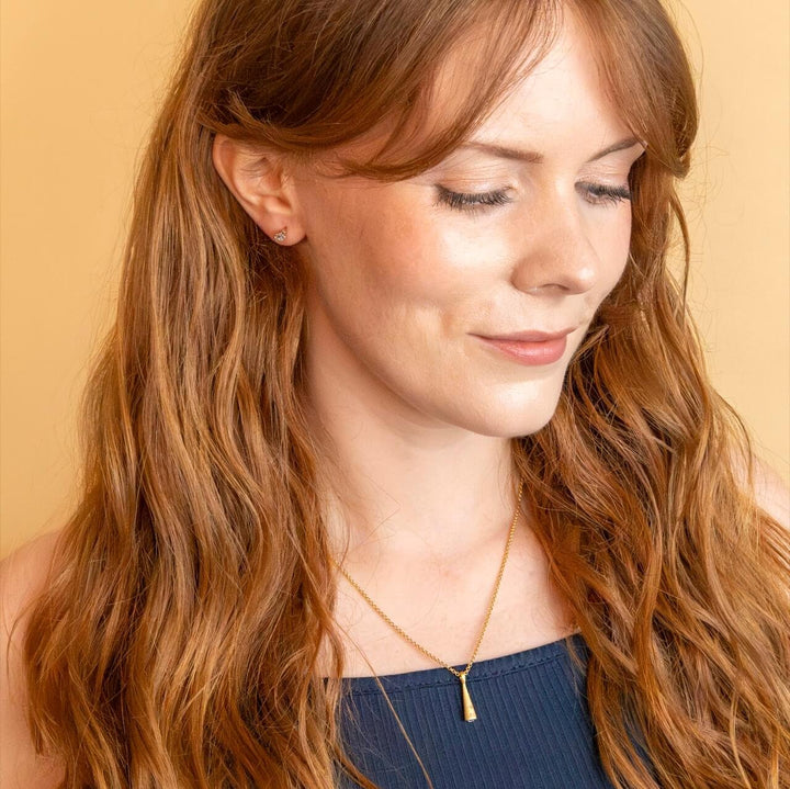 model wears 18k Gold Vermeil Comet Charm Pendant on rolo gold vermeil chain  - Claire Hill Designs