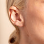 model wears Galaxy Sparkly cubic zirconia Gold Stud Earrings