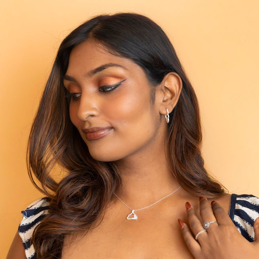 model wears Sparkly Silver Cloud Charm Pendant -  Claire Hill Designs