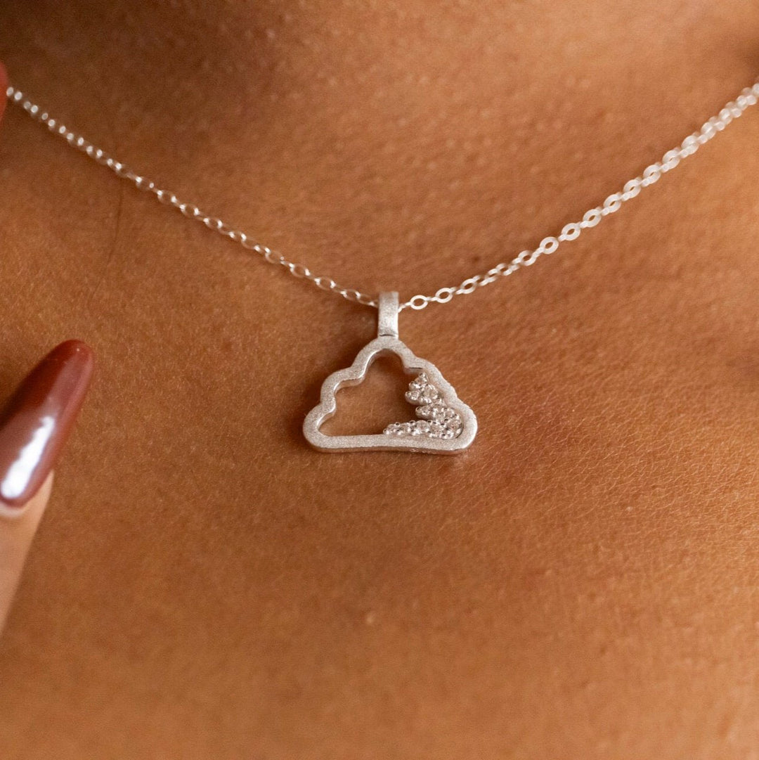 model wears Sparkly Silver Cloud Charm Pendant Necklace -  Claire Hill Designs