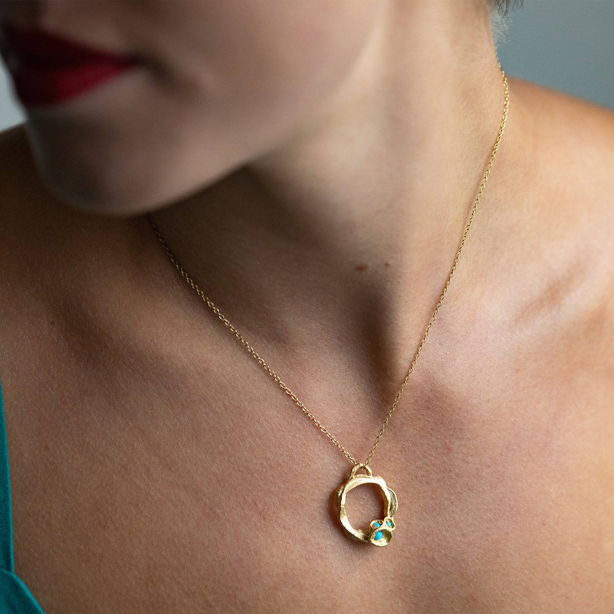 model wears Turquoise and Gold Birthstone Branch Circle Necklace - Large