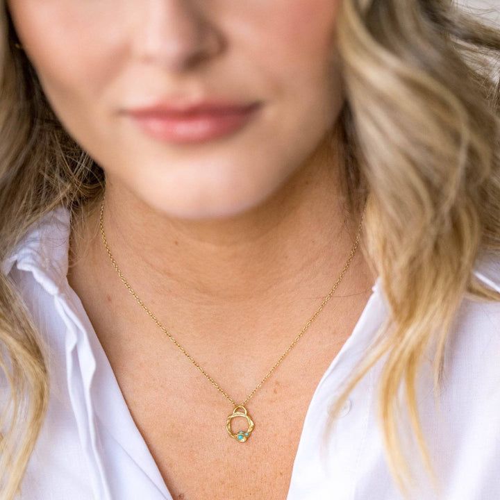model wears Turquoise and Gold Birthstone Branch Circle Necklace - Small