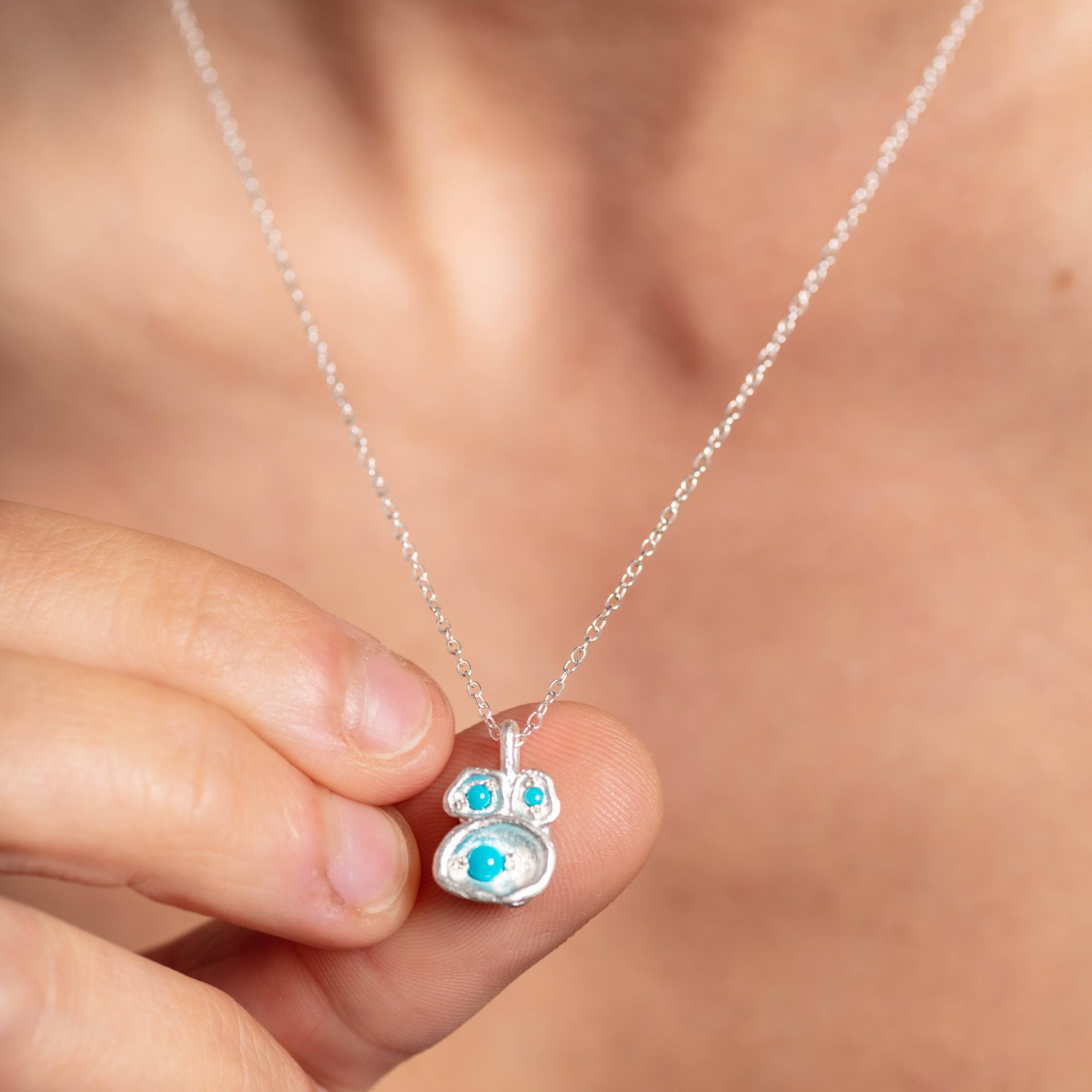 model wears -Turquoise and Silver Lichen Pendant Necklace - close up