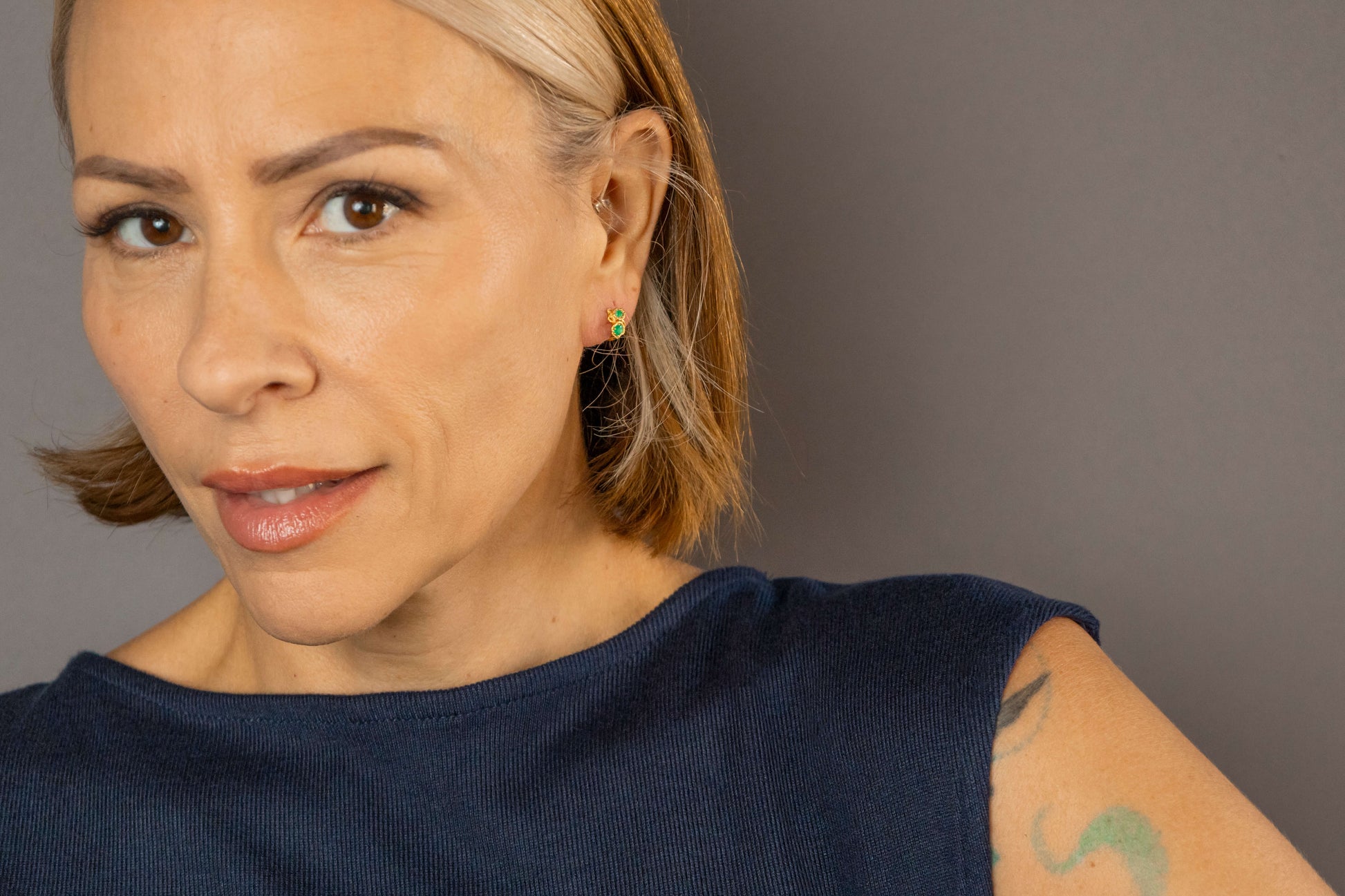 model wears Chalcedony Twisted Branch Gold Huggies