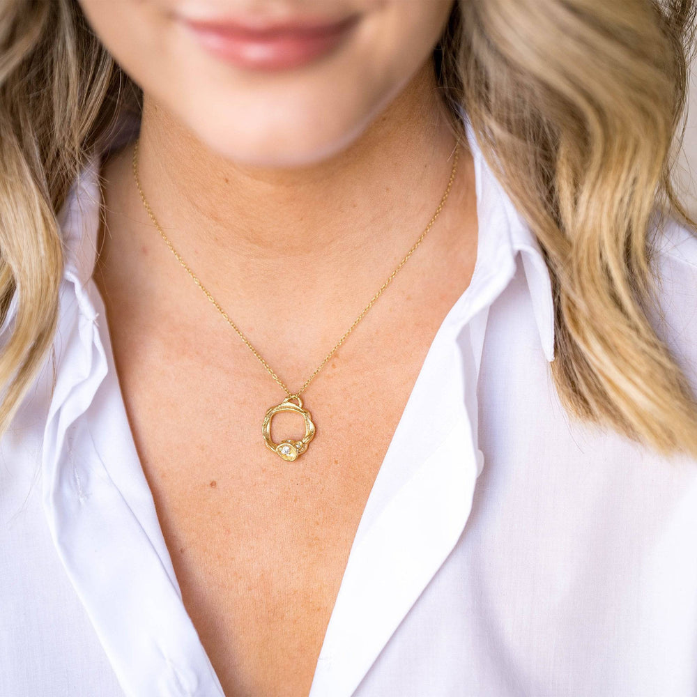 model wears White Topaz and Gold Birthstone Branch Circle Necklace - Large