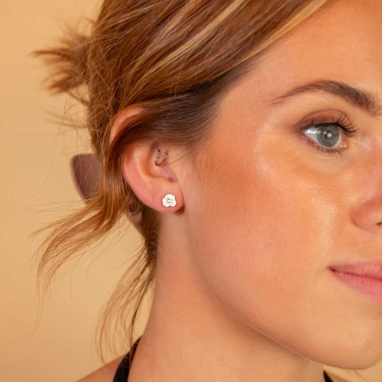 model wears White Topaz Silver Lichen Statement Stud Earrings