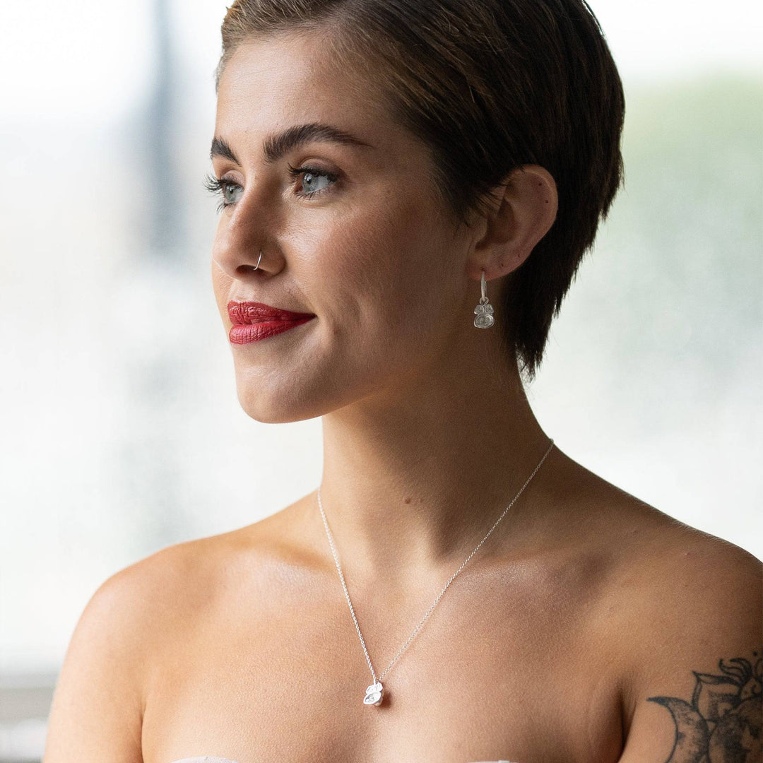model wears White Topaz and Silver Lichen Birthstone Pendant Necklace