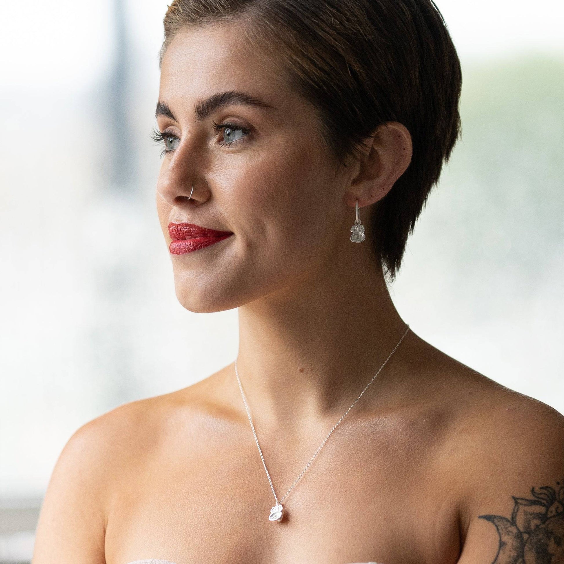 model wears White Topaz and Silver Lichen Birthstone Pendant Necklace