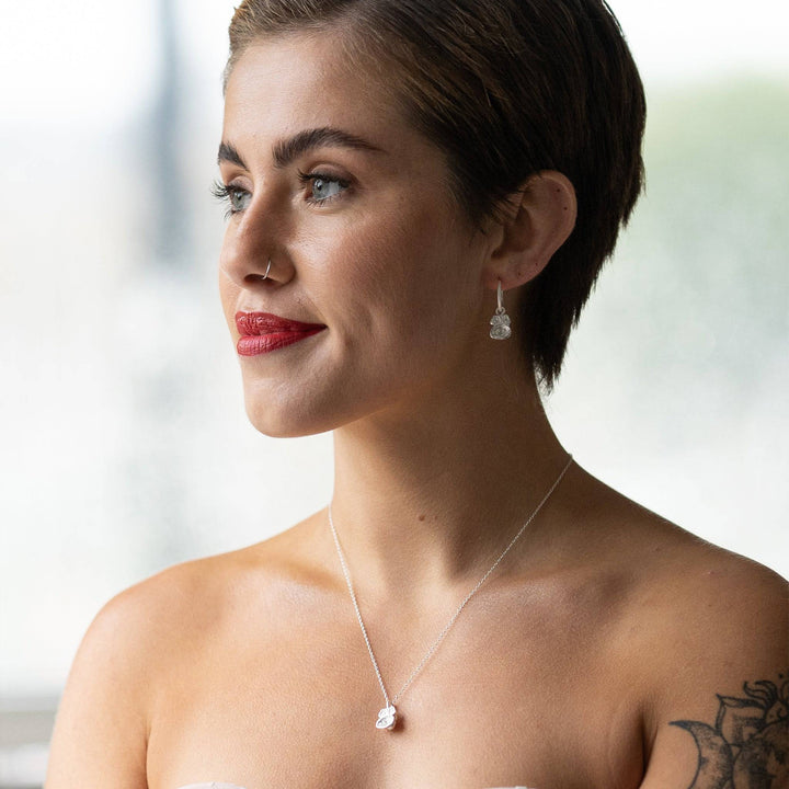 model wears White Topaz and Silver Lichen Birthstone Pendant Necklace