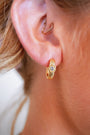 model wears White Topaz Gold Branch Hoop Earrings
