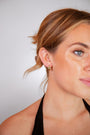 model wears White Topaz Gold Branch Hoop Earrings