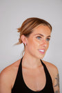 model wears white topaz silver branch hoop earrings

