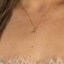 model wears Fearless Gold Shorthand Charm Necklace