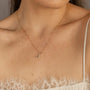 model wears Great Gold Shorthand Charm Necklace
