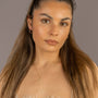 model wears Fearless Gold Shorthand Charm Necklace
